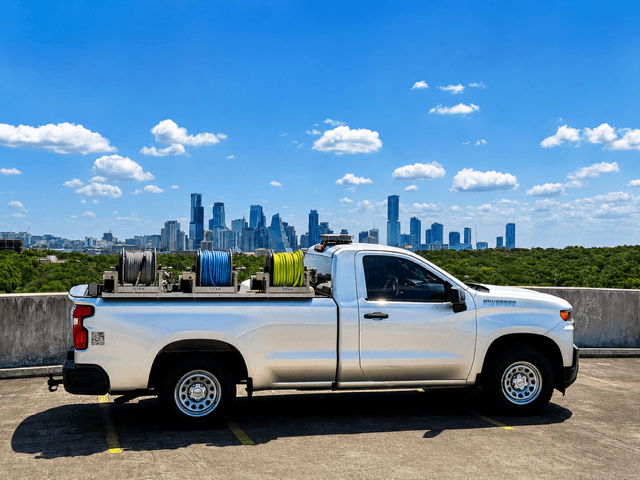 Hi-Tech Power Wash equipment truck set up for a job in Austin, TX