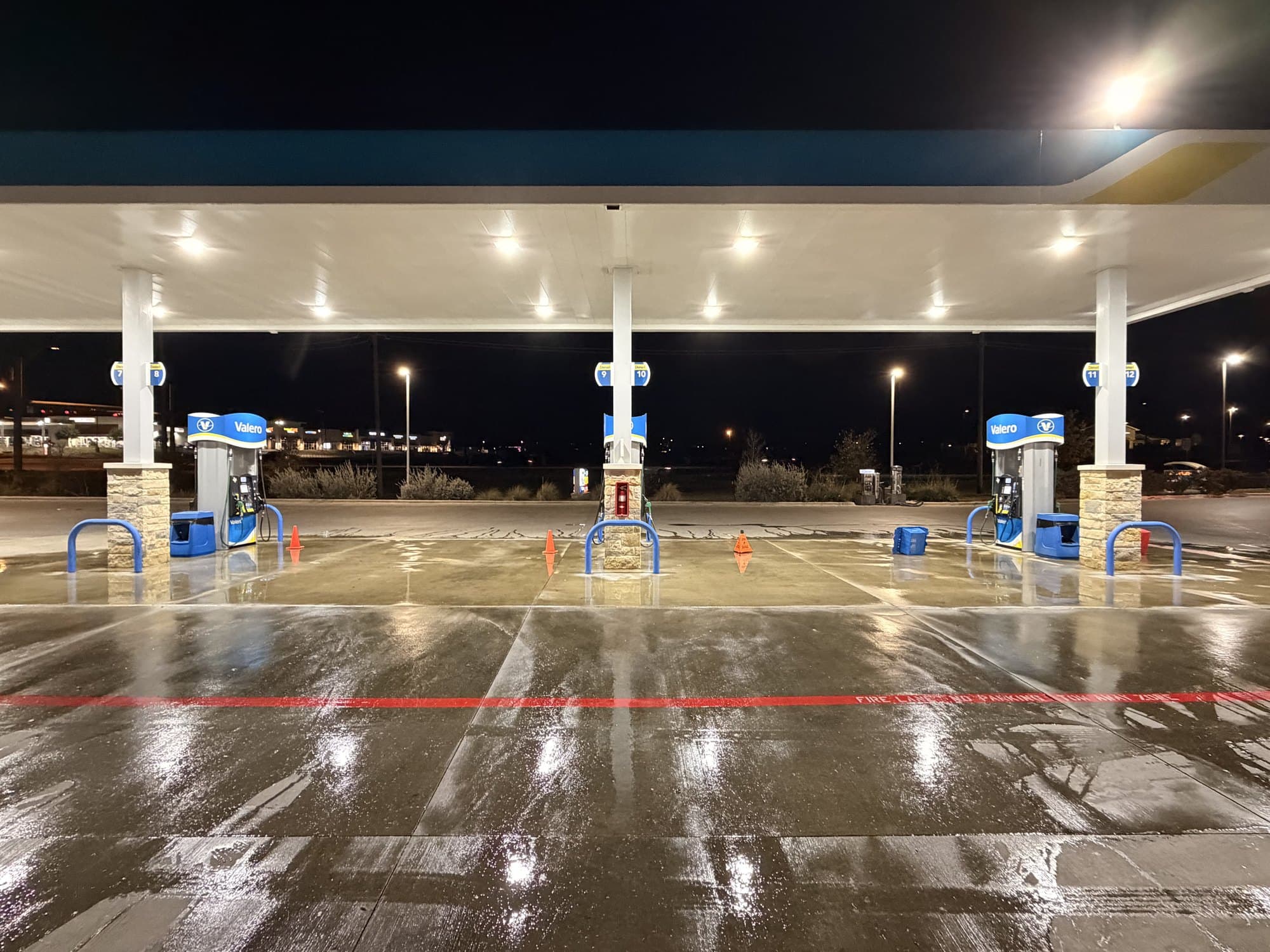 Gas station cleaning at night